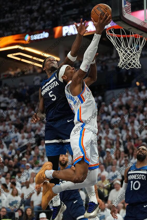 May 26, 2025; Minneapolis, Minnesota, USA; Oklahoma City Thunder guard Shai Gilgeous-Alexander (2) shoots the ball over Minnesota Timberwolves guard Anthony Edwards (5) in the first half during game four of the western conference finals for the 2025 NBA Playoffs at Target Center. Mandatory Credit: Jesse Johnson-Imagn Images NBA: Playoffs-Oklahoma City Thunder at Minnesota Timberwolves 