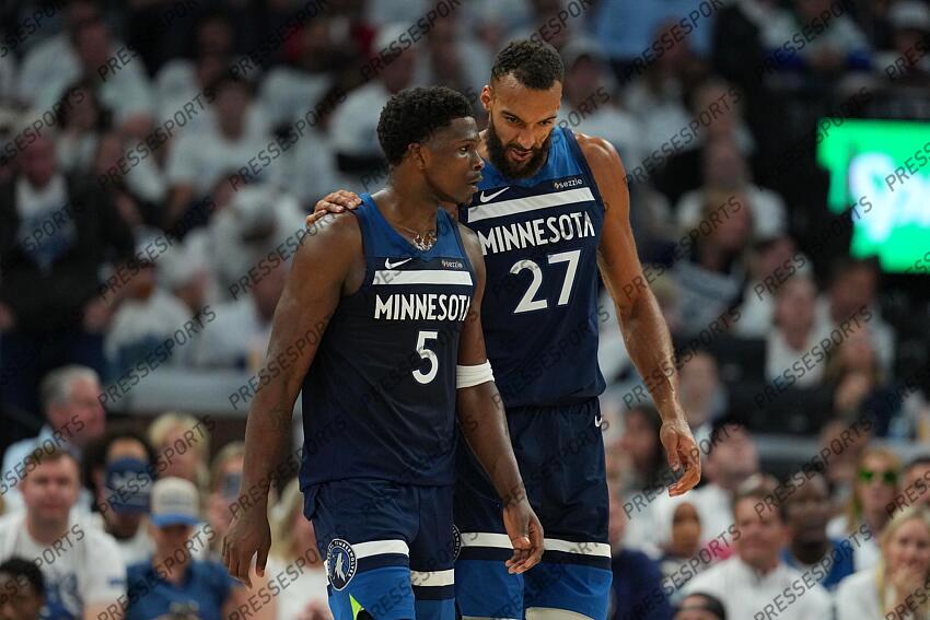 May 26, 2025; Minneapolis, Minnesota, USA; Minnesota Timberwolves guard Anthony Edwards (5) and center Rudy Gobert (27) talk against the Oklahoma City Thunder in the first half during game four of the western conference finals for the 2025 NBA Playoffs at Target Center. Mandatory Credit: Jesse Johnson-Imagn Images NBA: Playoffs-Oklahoma City Thunder at Minnesota Timberwolves 