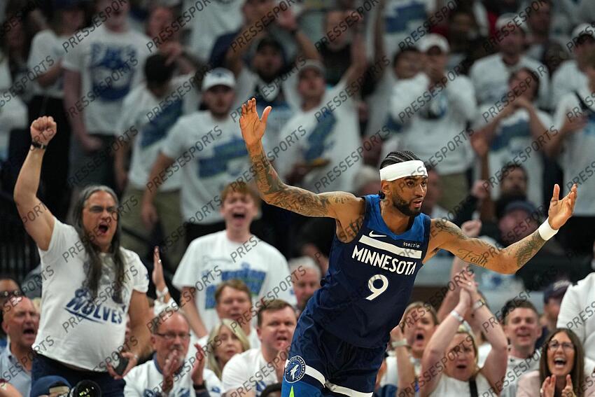 May 26, 2025; Minneapolis, Minnesota, USA; Minnesota Timberwolves guard Nickeil Alexander-Walker (9) reacts against the Oklahoma City Thunder in the first half during game four of the western conference finals for the 2025 NBA Playoffs at Target Center. Mandatory Credit: Jesse Johnson-Imagn Images NBA: Playoffs-Oklahoma City Thunder at Minnesota Timberwolves 