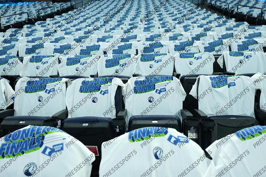 May 26, 2025; Minneapolis, Minnesota, USA; Souvenir shirts are placed on the chairs before game four of the western conference finals for the 2025 NBA Playoffs at Target Center. Mandatory Credit: Jesse Johnson-Imagn Images NBA: Playoffs-Oklahoma City Thunder at Minnesota Timberwolves 