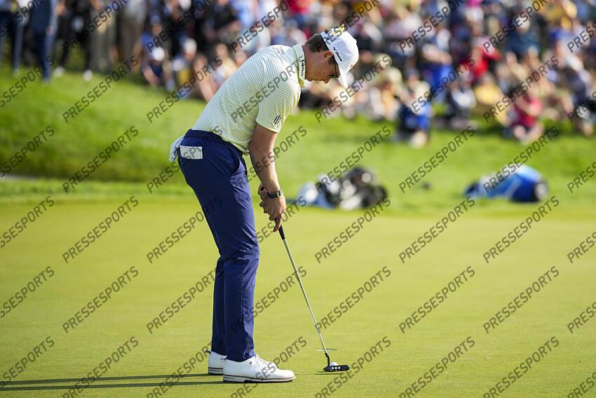 Jun 1, 2025; Dublin, Ohio, USA; Ben Griffin putts on the 18th green during the final round of the Memorial Tournament presented by Workday golf tournament. Mandatory Credit: Aaron Doster-Imagn Images PGA: the Memorial Tournament presented by Workday - Final Round 