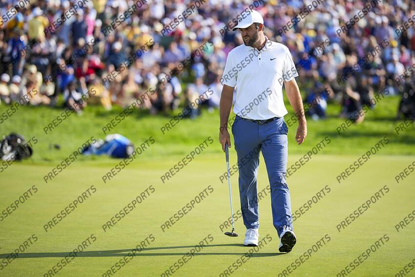 Jun 1, 2025; Dublin, Ohio, USA; Scottie Scheffler walks on the 18th green during the final round of the Memorial Tournament presented by Workday golf tournament. Mandatory Credit: Aaron Doster-Imagn Images PGA: the Memorial Tournament presented by Workday - Final Round 