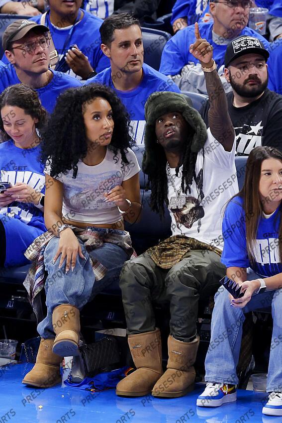 Jun 8, 2025; Oklahoma City, Oklahoma, USA; Twitch streamer and social media personality Kai Cenat (wearing hat) watches the game between the Oklahoma City Thunder and the Indiana Pacers during the fourth quarter of game two of the 2025 NBA Finals at Paycom Center. Mandatory Credit: Alonzo Adams-Imagn Images Game 2 Indiana Pacers at Oklahoma City Thunder 