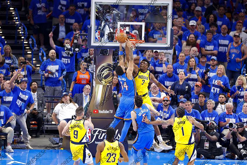 Jun 8, 2025; Oklahoma City, Oklahoma, USA; Oklahoma City Thunder forward Kenrich Williams (34) and Indiana Pacers center Thomas Bryant (3) battle for the rebound during the third quarter of game two of the 2025 NBA Finals at Paycom Center. Mandatory Credit: Alonzo Adams-Imagn Images Game 2 Indiana Pacers at Oklahoma City Thunder 