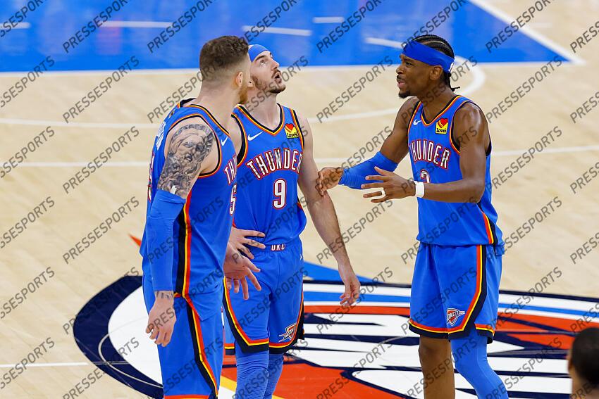 Jun 8, 2025; Oklahoma City, Oklahoma, USA; Oklahoma City Thunder center Isaiah Hartenstein (55) and guard Alex Caruso (9) and guard Shai Gilgeous-Alexander (2) talk during the third quarter against the Indiana Pacers in game two of the 2025 NBA Finals at Paycom Center. Mandatory Credit: Alonzo Adams-Imagn Images Game 2 Indiana Pacers at Oklahoma City Thunder 