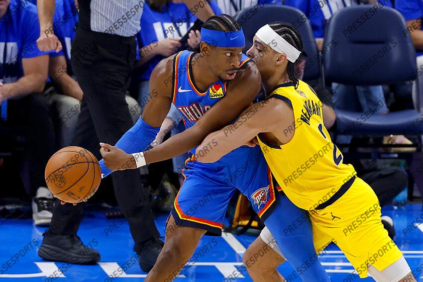 Jun 8, 2025; Oklahoma City, Oklahoma, USA; Oklahoma City Thunder guard Shai Gilgeous-Alexander (2) looks to move the ball to the basket past Indiana Pacers guard Andrew Nembhard (2) during the third quarter of game two of the 2025 NBA Finals at Paycom Center. Mandatory Credit: Alonzo Adams-Imagn Images Game 2 Indiana Pacers at Oklahoma City Thunder 