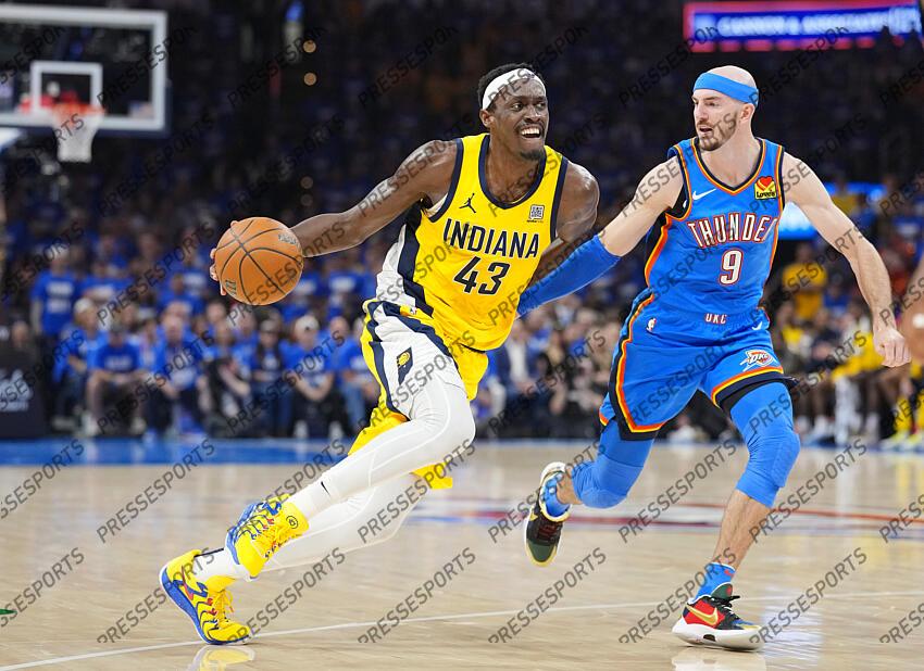 Jun 8, 2025; Oklahoma City, Oklahoma, USA; Indiana Pacers forward Pascal Siakam (43) dribbles the ball against Oklahoma City Thunder guard Alex Caruso (9) during the first half during game two of the 2025 NBA Finals at Paycom Center. Mandatory Credit: Kyle Terada-Imagn Images Game 2 Indiana Pacers at Oklahoma City Thunder 