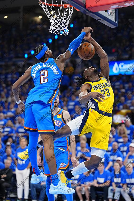 Jun 8, 2025; Oklahoma City, Oklahoma, USA; Oklahoma City Thunder guard Shai Gilgeous-Alexander (2) blocks the shot of Indiana Pacers forward Aaron Nesmith (23) during the first half during game two of the 2025 NBA Finals at Paycom Center. Mandatory Credit: Kyle Terada-Imagn Images Game 2 Indiana Pacers at Oklahoma City Thunder 