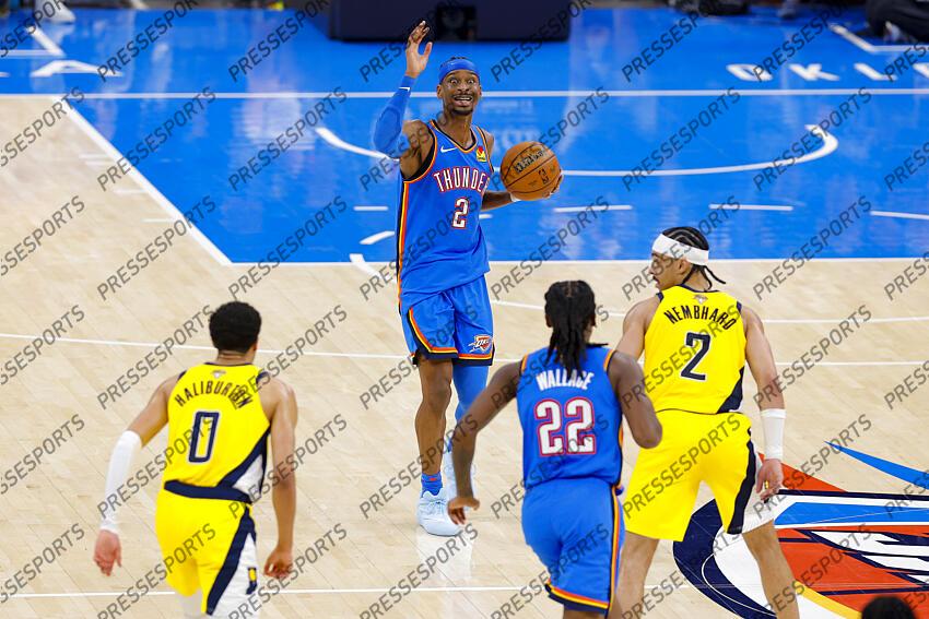 Jun 8, 2025; Oklahoma City, Oklahoma, USA; Oklahoma City Thunder guard Shai Gilgeous-Alexander (2) sets the play as guard Cason Wallace (22) and Indiana Pacers guard Tyrese Haliburton (0) and guard Andrew Nembhard (2) look on during the second quarter of game two of the 2025 NBA Finals at Paycom Center. Mandatory Credit: Alonzo Adams-Imagn Images Game 2 Indiana Pacers at Oklahoma City Thunder 