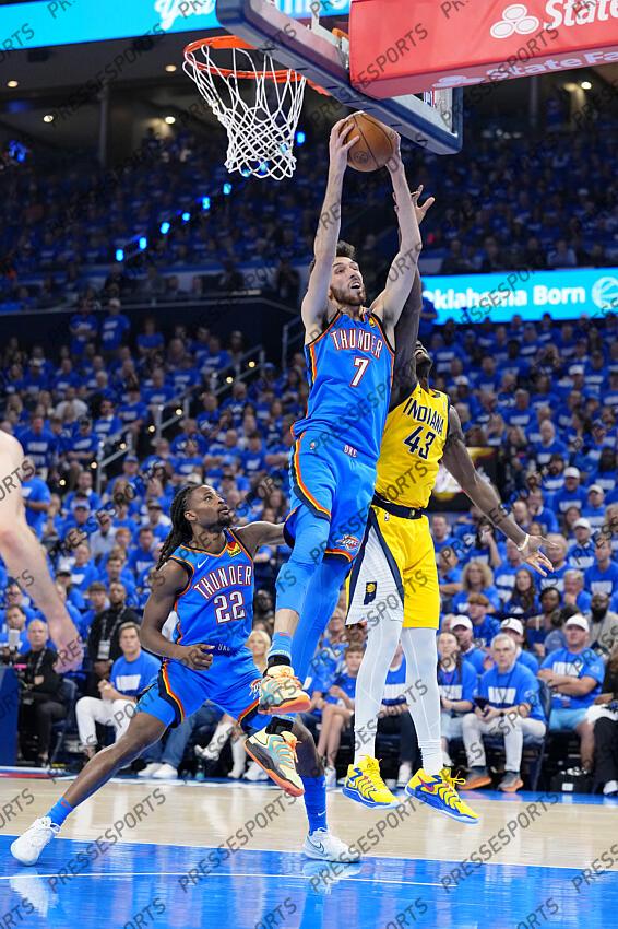Jun 8, 2025; Oklahoma City, Oklahoma, USA; Oklahoma City Thunder forward Chet Holmgren (7) reaches for the ball against Indiana Pacers forward Pascal Siakam (43) during the first half during game two of the 2025 NBA Finals at Paycom Center. Mandatory Credit: Kyle Terada-Imagn Images Game 2 Indiana Pacers at Oklahoma City Thunder 