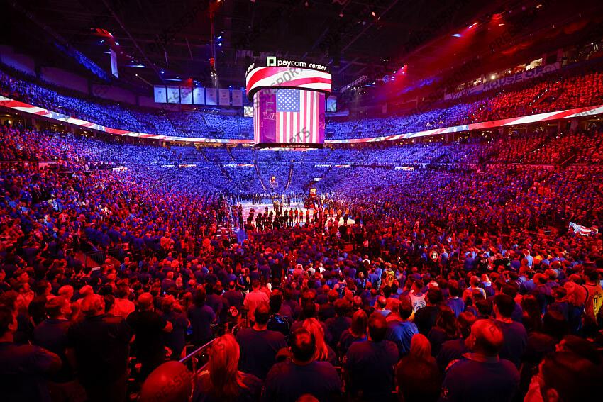 Jun 8, 2025; Oklahoma City, Oklahoma, USA; A view of the fans and the arena and the court and the American flag during the anthem before the game between the Oklahoma City Thunder and the Indiana Pacers in game two of the 2025 NBA Finals at Paycom Center. Mandatory Credit: Alonzo Adams-Imagn Images Game 2 Indiana Pacers at Oklahoma City Thunder 