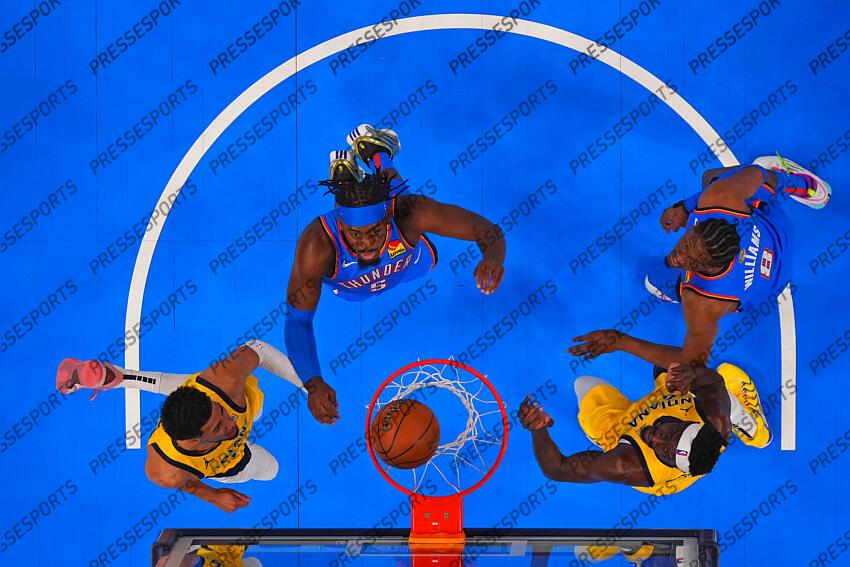 Jun 8, 2025; Oklahoma City, Oklahoma, USA; Indiana Pacers guard Tyrese Haliburton (left) and forward Pascal Siakam (right) watch the ball go into the basket against Oklahoma City Thunder guard Luguentz Dort (5) and forward Jalen Williams (8) during the first half during game two of the 2025 NBA Finals at Paycom Center. Mandatory Credit: Kyle Terada-Imagn Images Game 2 Indiana Pacers at Oklahoma City Thunder 